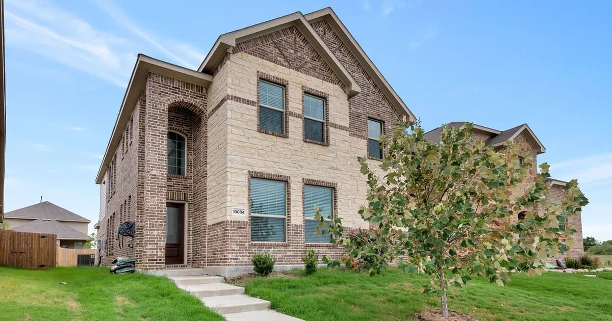 Allen single-family rental home with established lawn and mature trees in warm afternoon light — the Allen ISD attendance-zone rental stock supporting single-feeder Allen HS demand and Collin County corporate-corridor families