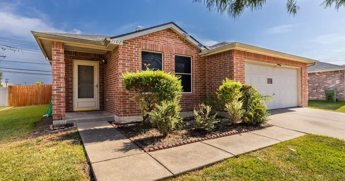 New-construction Frisco single-family rental home with manicured landscaping in golden afternoon light — the Frisco ISD attendance-zone rental stock driving demand from corporate-relocation households and PGA of America headquarters professionals