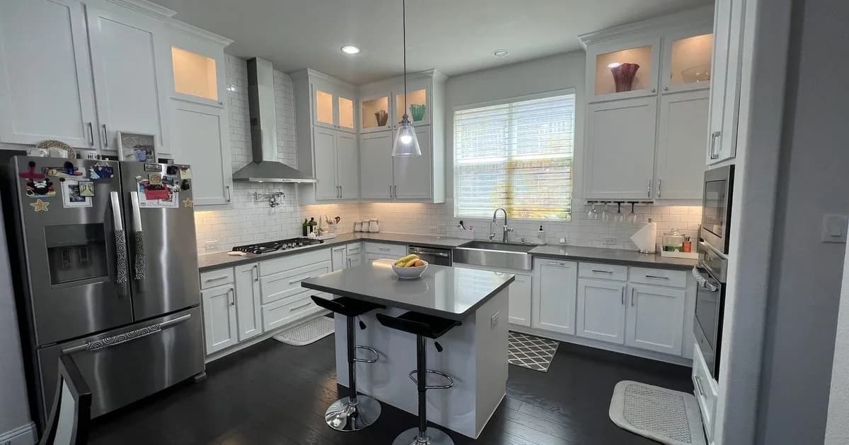 Garland single-family rental home with established Dallas County character in warm afternoon light — the Garland ISD attendance-zone rental stock anchoring manufacturing-corridor workforce demand and rent-to-cost-basis-favorable single-family inventory