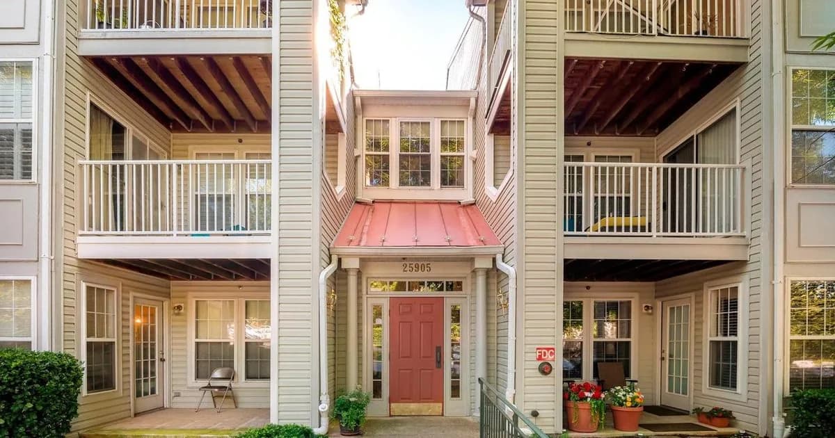 Older single-family rental homes on a Capitol Heights Maryland street in warm daylight — the inside-the-Beltway Blue Line Metro, Prince George’s County PGCPS-zoned stock that anchors DC-commuter rental demand