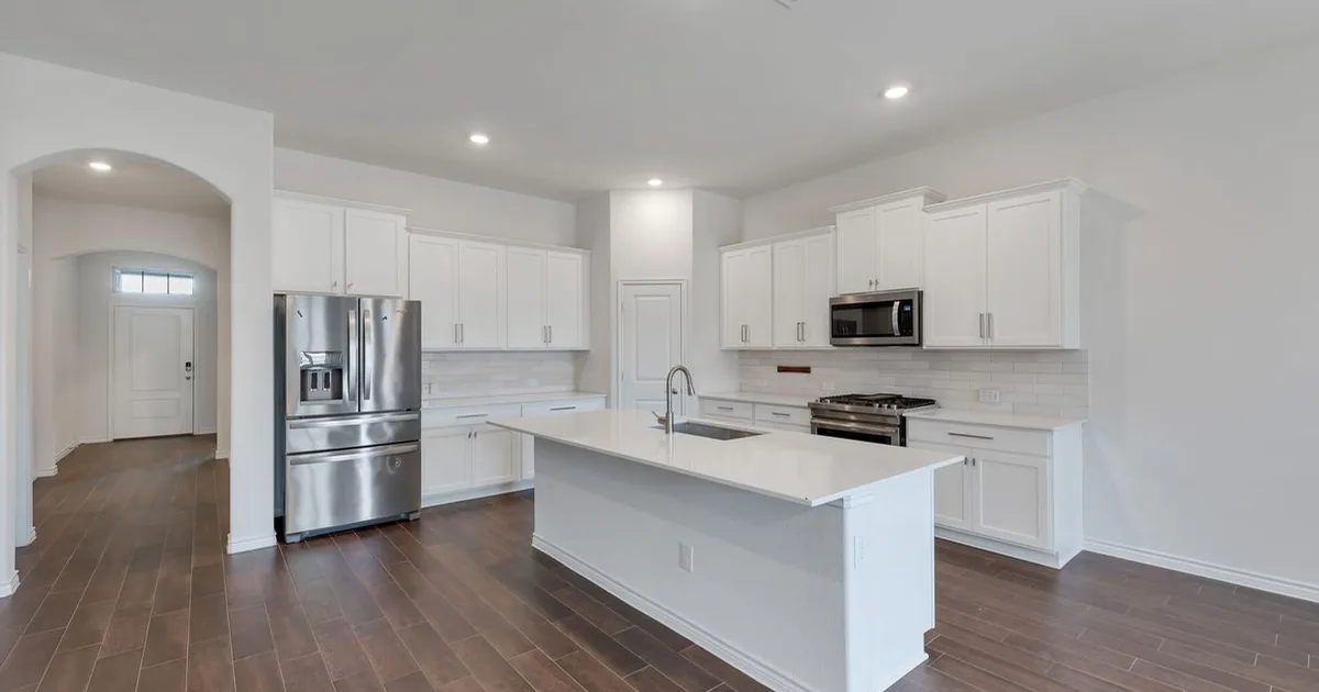 Irving single-family rental home with mature landscaping in warm afternoon light — the Irving ISD attendance-zone rental stock anchoring Las Colinas corporate-relocation demand, DFW Airport workforce, and Dallas County corporate-professional renting-before-buying households
