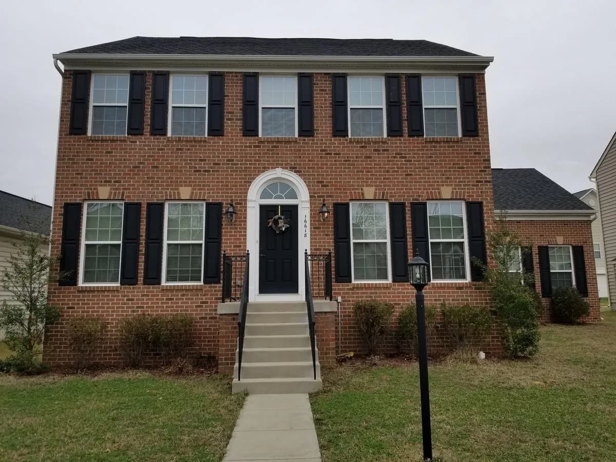 Brick colonial rental home in Northern Virginia, photographed and market-ready for listing by Flat Fee Landlord