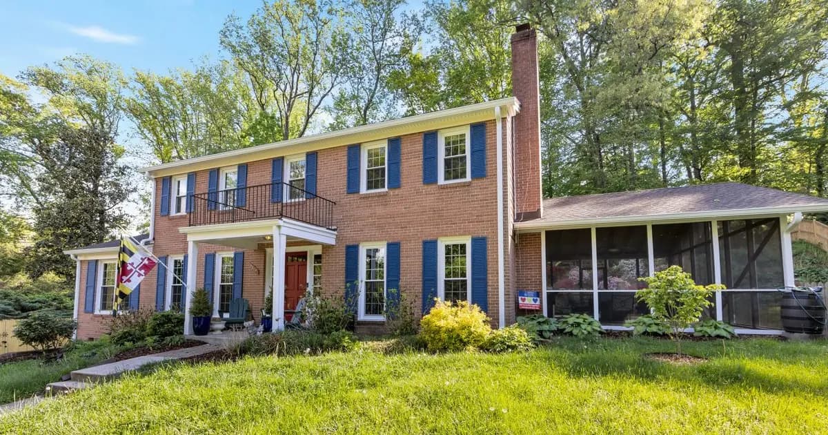 Single-family rental home on a Glen Burnie Maryland street in warm daylight — the BWI-corridor Anne Arundel County Public Schools stock that anchors airport, Fort Meade, and Baltimore commuter rental demand
